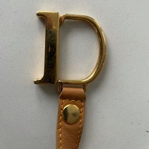Christian Dior Denim zip key chain with gold D hook for keys.
